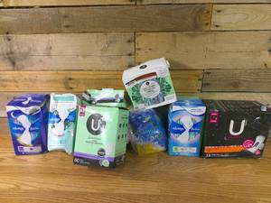 lot 242 image: 8 Packs of Feminine Hygiene Pads-Distress Packages