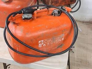 lot 292 image: 6-Gallon Metal Marine Gas Tank with Pump Hose