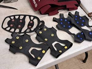 lot 402 image: Lot of (2 Pair) Snow Cleats with One Extra Cleat
