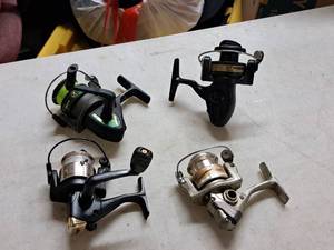 lot 459 image: Lot of (4) Assorted Open Faced Fishing Reels