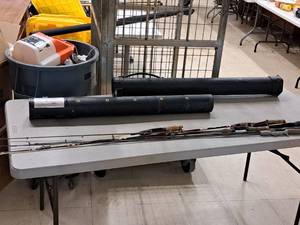lot 491 image: Fishing Rod Case with (6) Assorted Fishing Rods