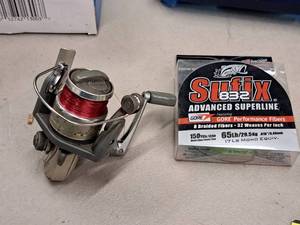lot 497 image: Lot of (2) Shimano 1000 Fishing Reels with Extra Fishing Line