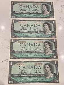lot 68 image: 1954 Uncirculated Consecutive Numbered Canadian Dollars