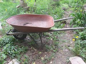 (OUT) Red Wheelbarrow - Tire Is Low...