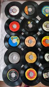 45 RPM Records with Solid Green Case