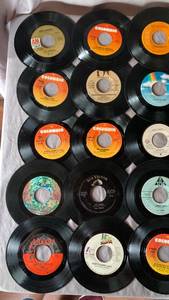 45 RPM Records with Blue Green Patterned Case
