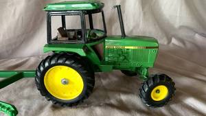 Red ERTL Tractor, Green ERTL Tractor with Plow