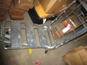 lot 73 image: Metal rolling rack style warehouse flatbed cart