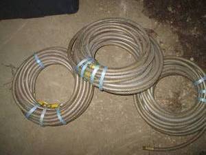 lot 91 image: (3) rolls of 38 200PSI clear food grade hose