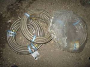 lot 92 image: (3) rolls of 38 200PSI clear food grade hose