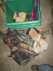 lot 106 image: Clamshell closing tote full of assorted tool belts