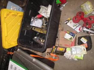 lot 122 image: Tote of door hardware plus assorted building tools and supplies