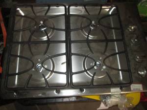 lot 123 image: GE 30 built-in gas stove cooktop in a stainless steel finish with fitting