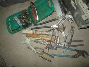 lot 137 image: Assortment of Channel locks, pliers, hammers and other hand tools