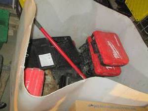 lot 199 image: Open top bulk tank plus large assortment of empty Milwaukee and other brand tool cases