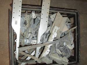 lot 236 image: Milk crate of metal framing brackets