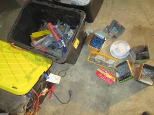 lot 256 image: Tote of assorted caulking guns, part organizers and construction hardware