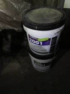 lot 8 image: (2) 4-gallon buckets of Roberts 2001 felt-back sheet vinyl adhesive