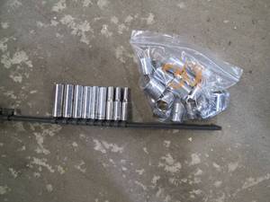 lot 31 image: 10pc SAE & 10pc Metric 38in Shallow socket sets plus 14in deep well socket set in rail clip