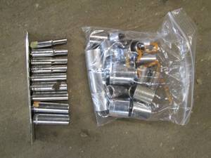 lot 33 image: Craftsman 14pc Metric & 14pc SAE 38in Shallow socket sets plus 14in deep well socket set in rail clip