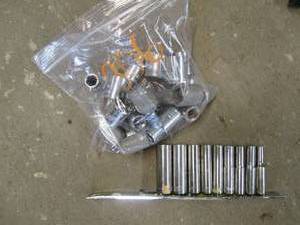 lot 36 image: 10pc SAE & 10pc Metric 38in Shallow socket sets plus 14in deep well socket set in rail clip