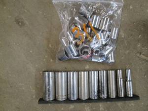 lot 37 image: Craftsman 13pc Metric & 13pc SAE 38in Shallow socket sets plus 12in SAE deep well socket set