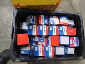 lot 45 image: Heavy duty Storage Tote containing an assortment of Atlas gas and oil filters