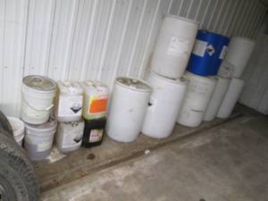 lot 154 image: Large lot of 55-gallon, 15-gallon and 5-gallon drums, buckets and jugs (some containing small amounts of assorted liquids)