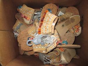 lot 162 image: Box of Assorted size girls Disney moccasin style flip flop sandals