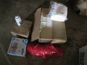 lot 264 image: Case of muti-fold towels, Pelican premium countertop drinking water system, roll of red plastic and other misc