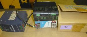 lot 32 image: Power supplies and amp
