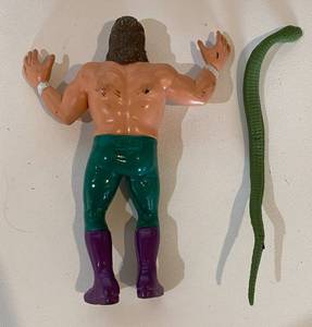 lot 11 image: Jake the Snake w Damien the Python Accesory 1987 WWF Wrestling Titan Sports Vintage 8 Action Figure