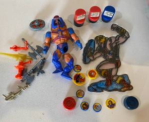 lot 33 image: He-Man Masters of the Universe Various Accessories, Stamps, and More