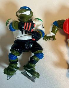 lot 23A image: (3) TMNT Action Figures - Baskatball Donatello, Hockey and Footbal Leonardo 1991 Teenage Mutant Ninja Turtles Vintage Toys
