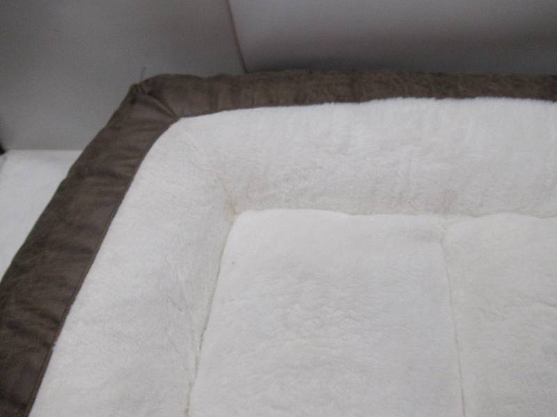 lot 212 image: NEW Kirkland XL Signature Rectangular Bolster 46 x 36 Pet Bed, Brown Faux Leather