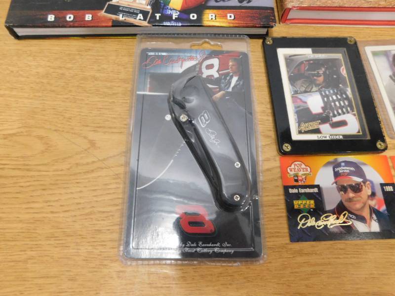 lot 88 image: Dale Earnhardt Sr. Collectible Lot - Pocket Knife, Cards, Books and More