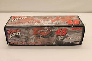 lot 1 image: Sterling Marlin #40 Souvenir Rig Limited Edition Collectible Die-cast Race Car wBox