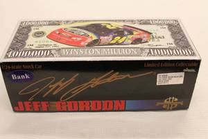 lot 12 image: Jeff Gordon #24 Dupont 1,000,000 Winston Limited Edition Action Collectible Die-cast Race Car BANK with Box