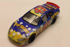 lot 69 image: John Andretti #43 Pop Secret Die-Cast Stock Car Replica - no box