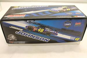 lot 71 image: Jimmy Johnson #48 Lowes 2009 Impala Action Die-Cast Stock Car Replica with Box