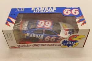lot 76 image: Casey Mears Kansas Jayhawks Racing Champions Limited Edition Die-Cast Stock Car Replica with Box
