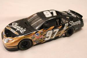 lot 104 image: Kurt Busch 97 Ford Taurus Team Caliber Die-Cast Replica - No Box
