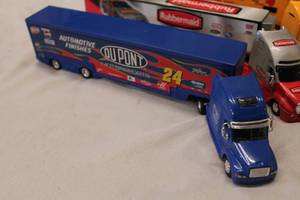 lot 117 image: Set of 5 NASCAR Tractor Trailer Haulers