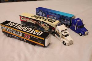 lot 119 image: Lot of 2 NASCAR Tractor Trailer Haulers and 1 Trailer Missing Truck