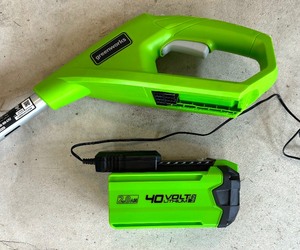 lot 118 image: Greenworks Cordless String Trimmer with Battery and Charger