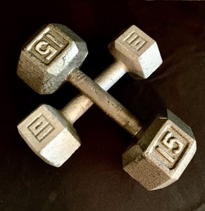 lot 53 image: Pair of Cast Iron Hex Dumbbells 10 and 15 Pounds