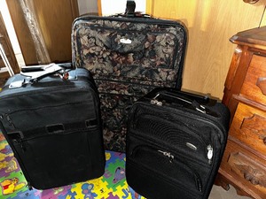 lot 274 image: Three Rolling Suitcases