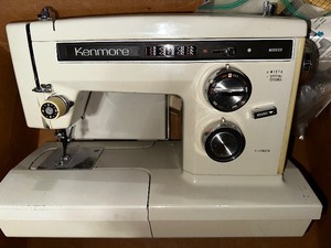 lot 312 image: Vintage Kenmore 14 Stitch Sewing Machine with Manual and Accessories