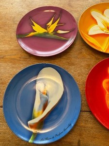 lot 110 image: Set Of Four Le Fleurs De Perfumes Givenchy Plates