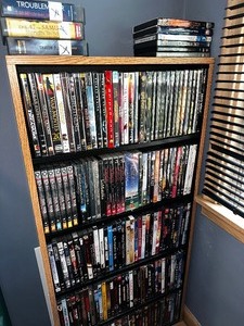 lot 31 image: Bookcase And All DVDs Included